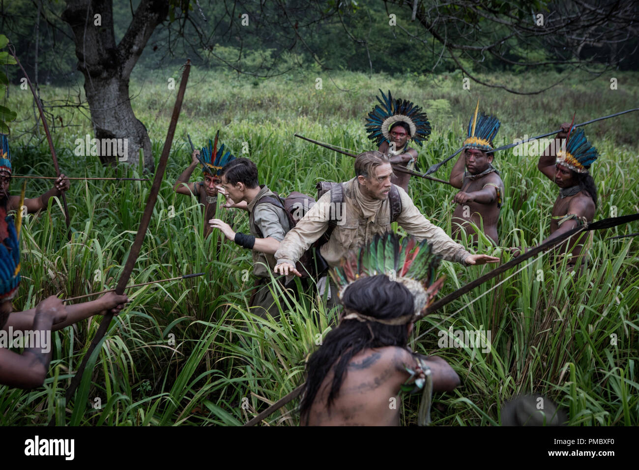 Tom Holland (center, left) stars as Jack Fawcett and Charlie Hunnam (center, right) stars as Percy Fawcett in director James Gray's THE LOST CITY OF Z, an Amazon Studios and Bleecker Street release. (2017) Stock Photo