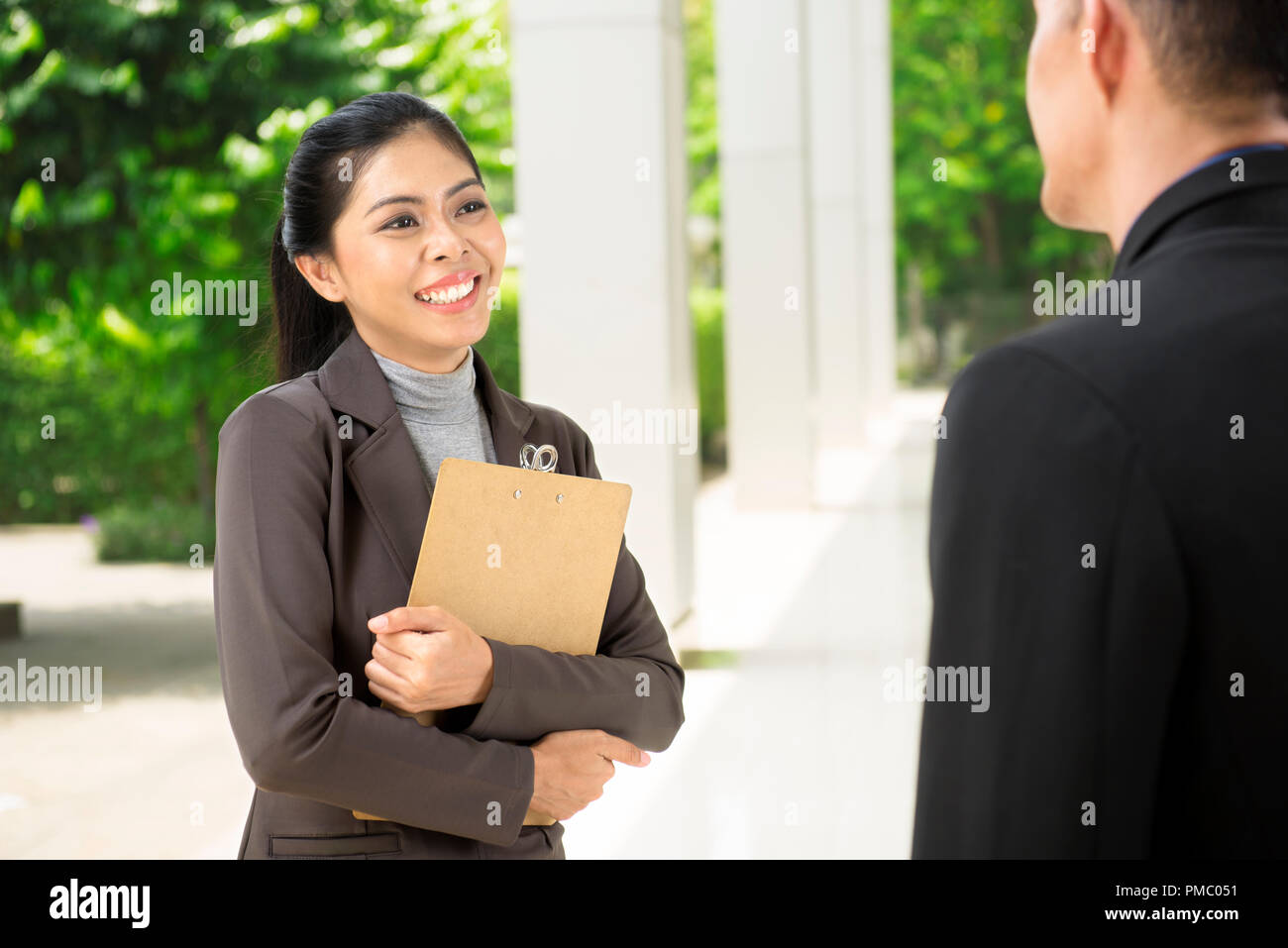 Happy asian business partner in hi-res stock photography and images - Alamy