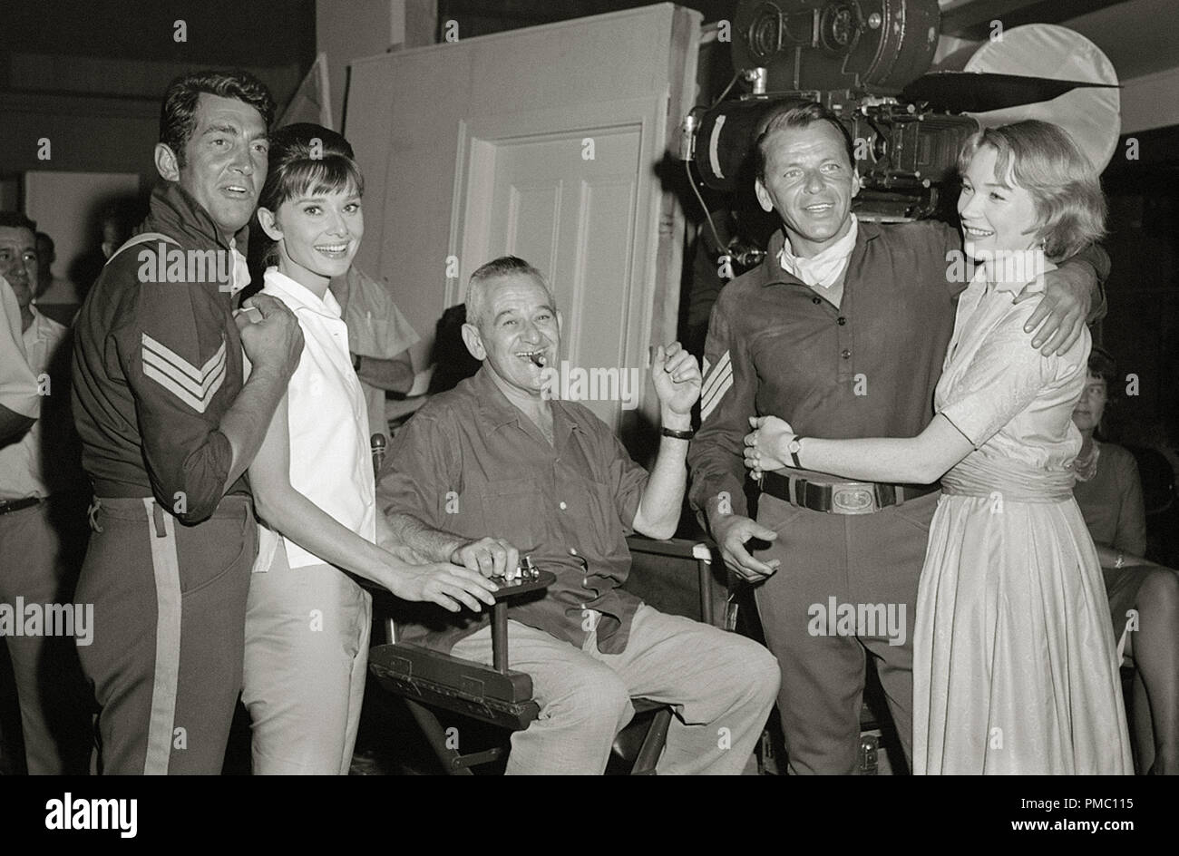 Dean Martin, Audrey Hepburn, director William Wyler, Frank Sinatra and Shirley MacLaine on the set of the 1961 film 'The Children's Hour' (1961) United Artists  File Reference # 33595 040THA Stock Photo