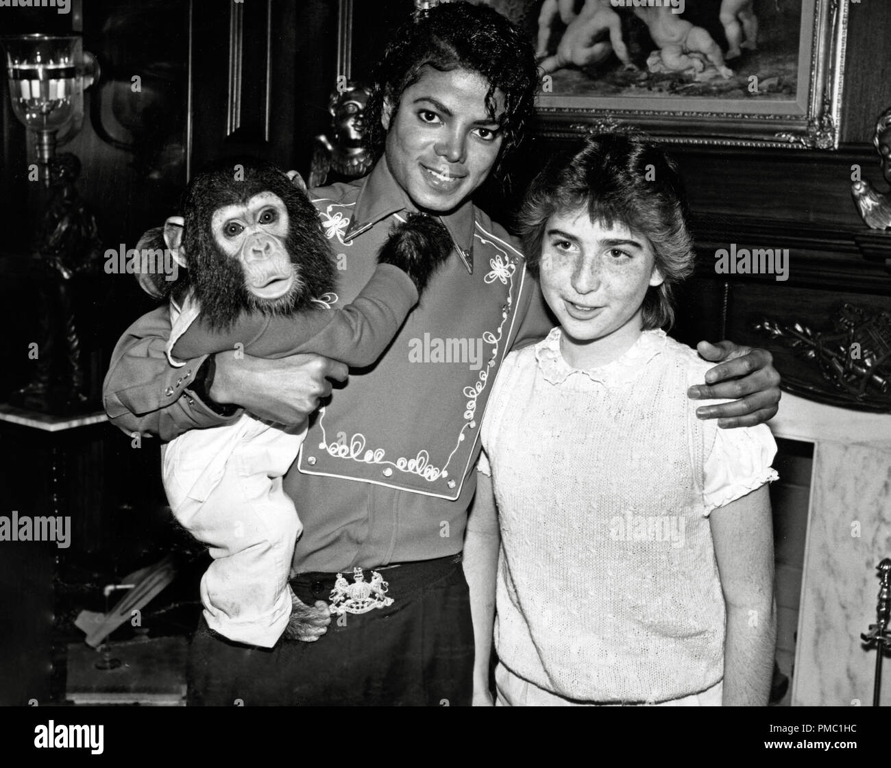 Michael Jackson,  poses with 14-year-old fan and his pet chimpanzee Bubbles at the Neverland Ranch circa 1986   File Reference # 33595 499THA Stock Photo
