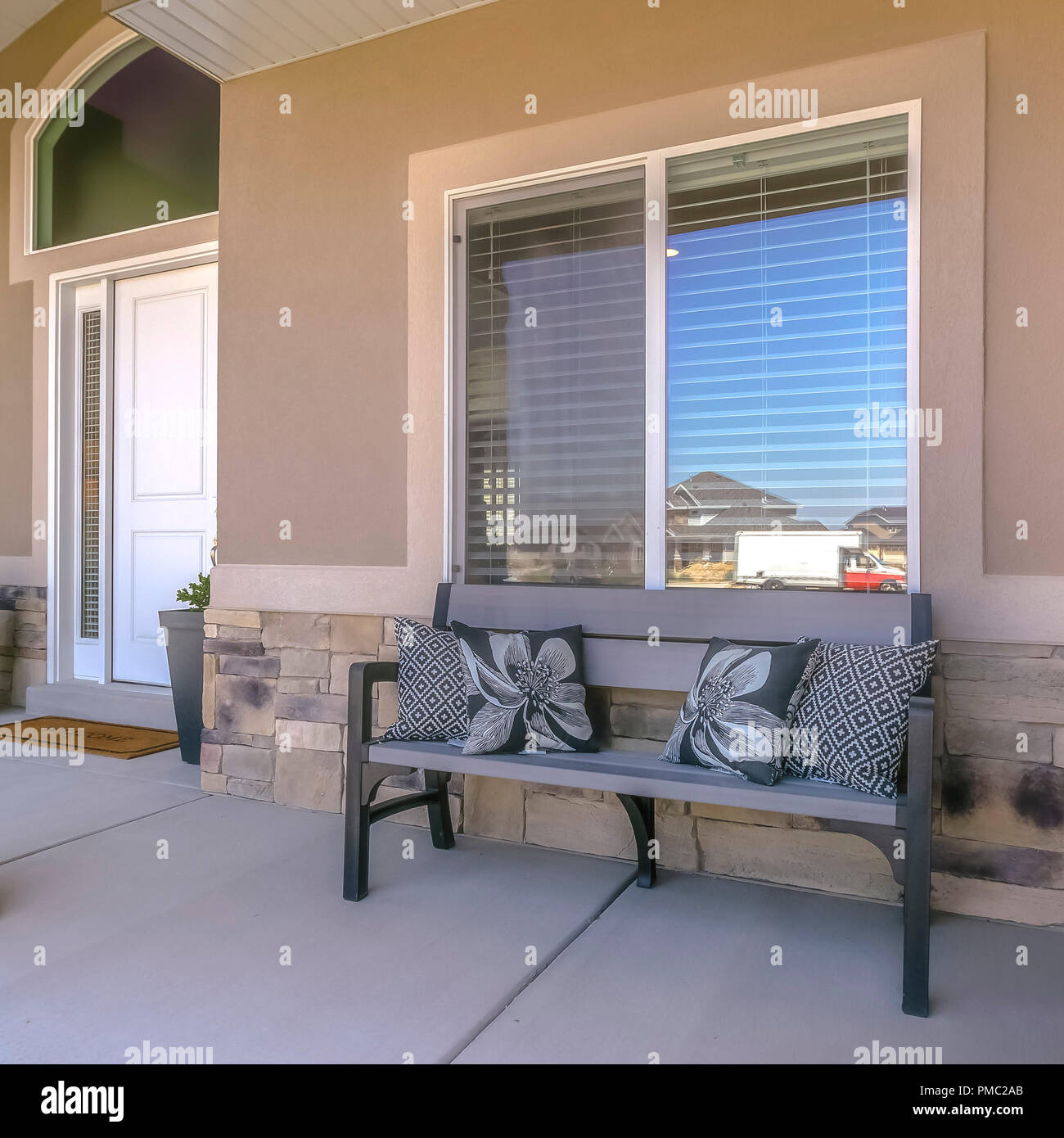 Covered front patio of a house in Utah Stock Photo Alamy