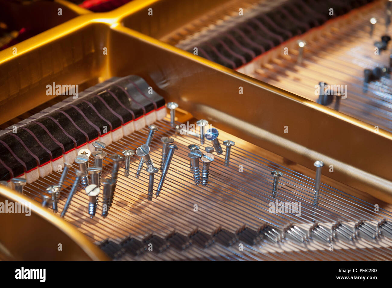 Piano prepared to play the music of John Cage Stock Photo - Alamy