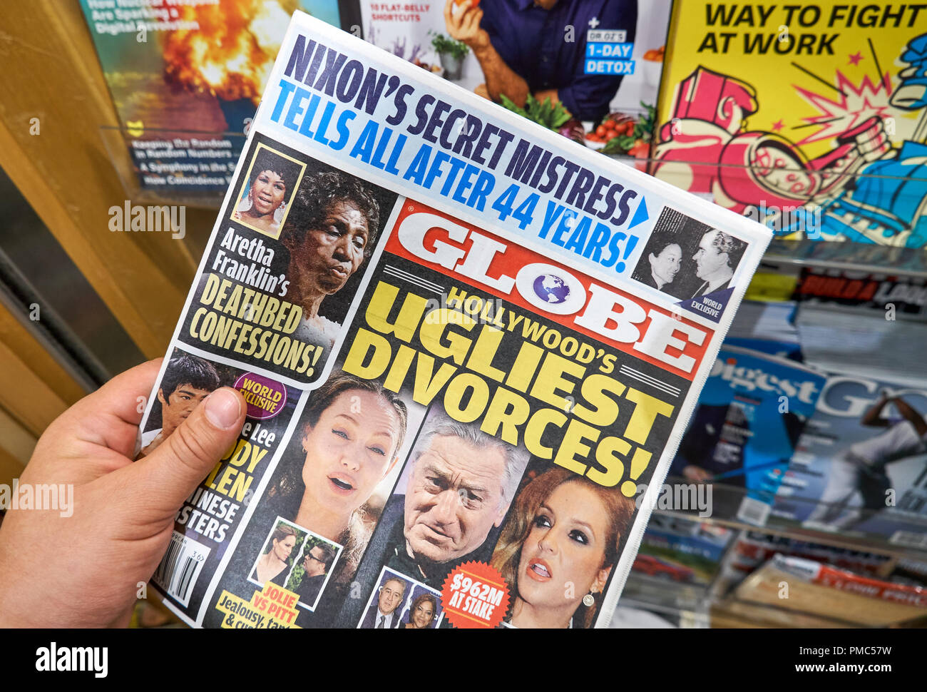 MIAMI, USA - AUGUST 22, 2018: Globe tabloid in a hand. Globe is a supermarket tabloid Stock Photo