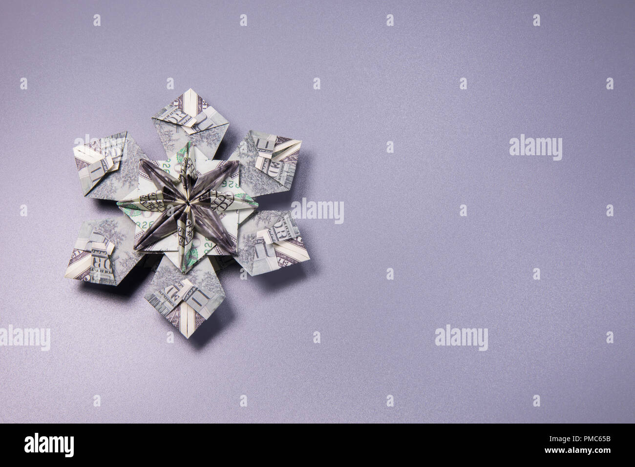 Money Origami snowflake Stock Photo - Alamy