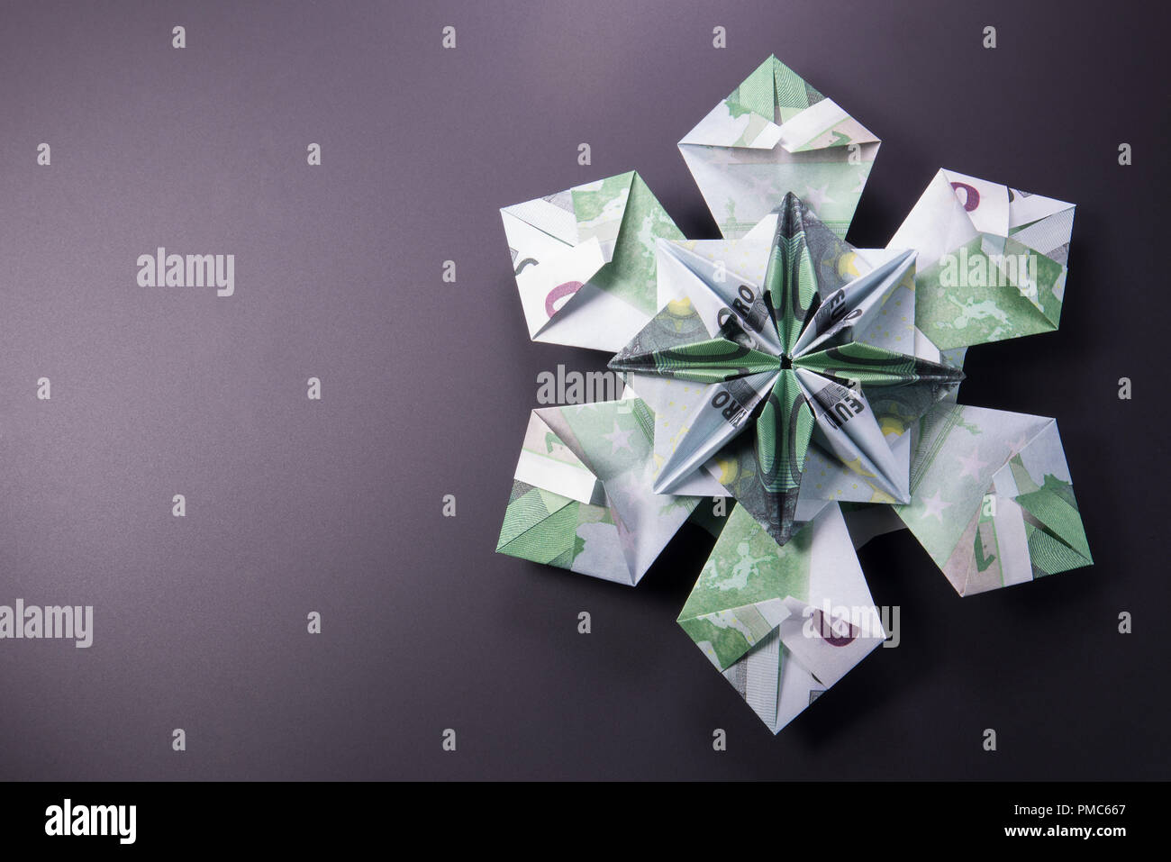 Money Origami snowflake Stock Photo - Alamy