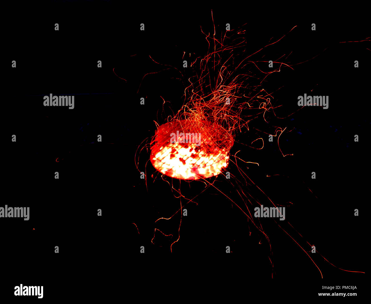 Blacksmith forge, Fire particles flying around Stock Photo - Alamy