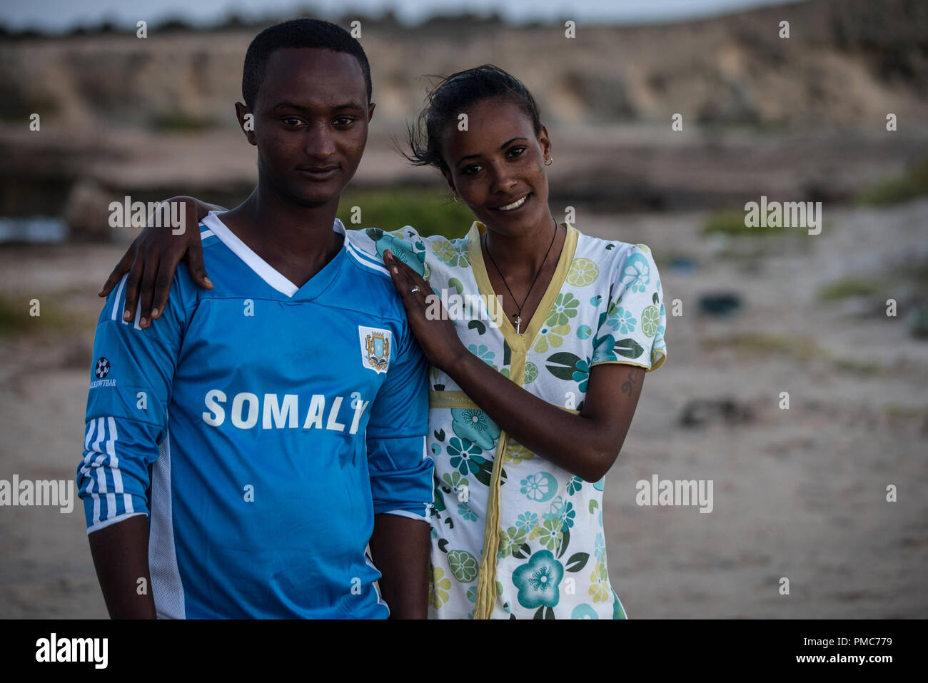 A Somali couple enjoys a moment at the beach inside the African Union Mission in Somalia (AMISOM) base in Mogadishu, Somalia, August 8, 2016. Stock Photo