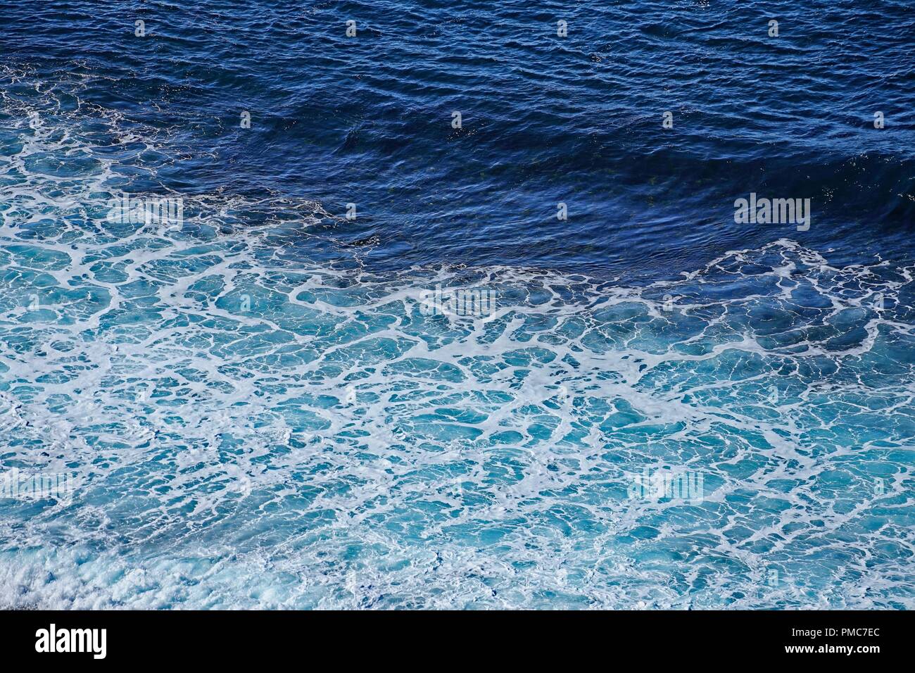 Seafoam and water, viewed from above and closeup. Stock Photo