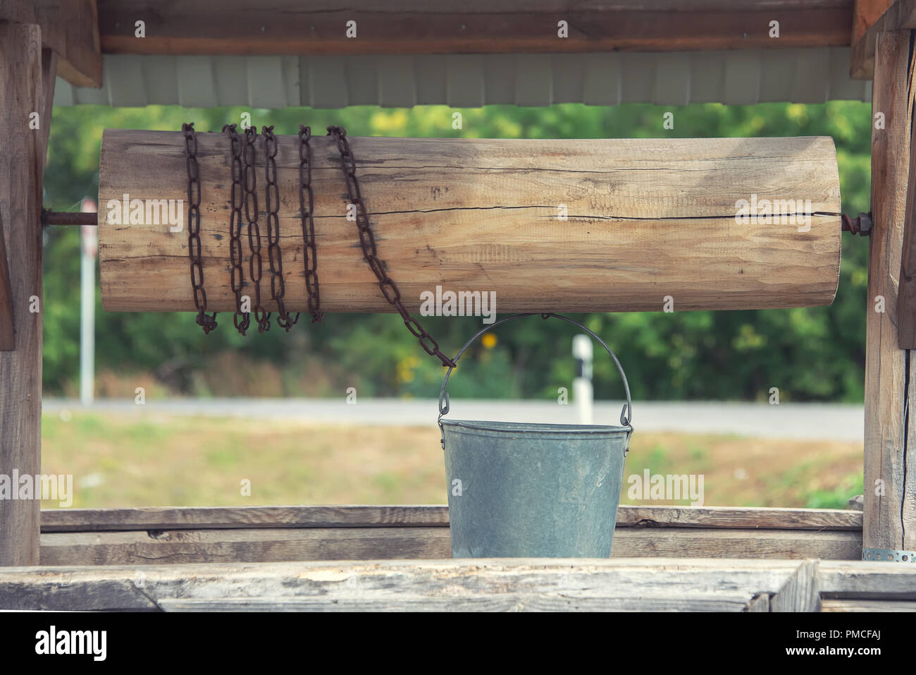 Brick water well wooden roof hi-res stock photography and images - Alamy