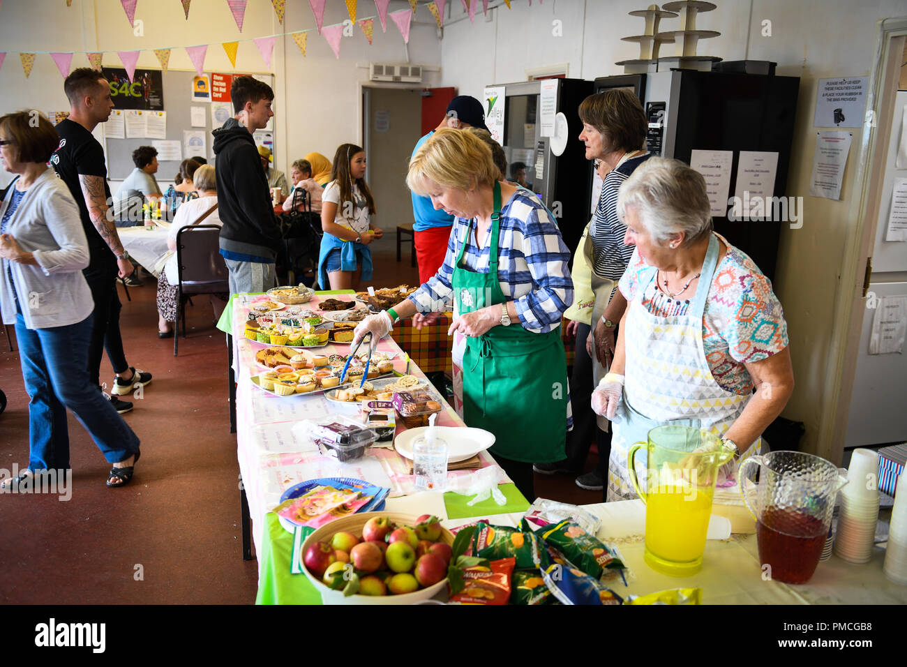 Fruit on sale at a market stall with price tags Stock Photo