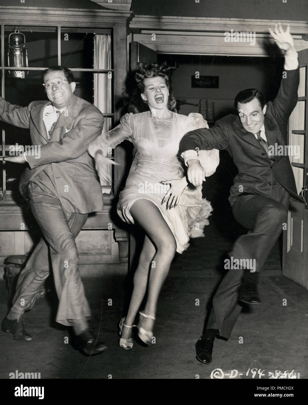 Rita Hayworth, Gene Kelly, Phil Silvers,  in 'Cover Girl' (Columbia, 1944).   File Reference # 33635 309THA Stock Photo