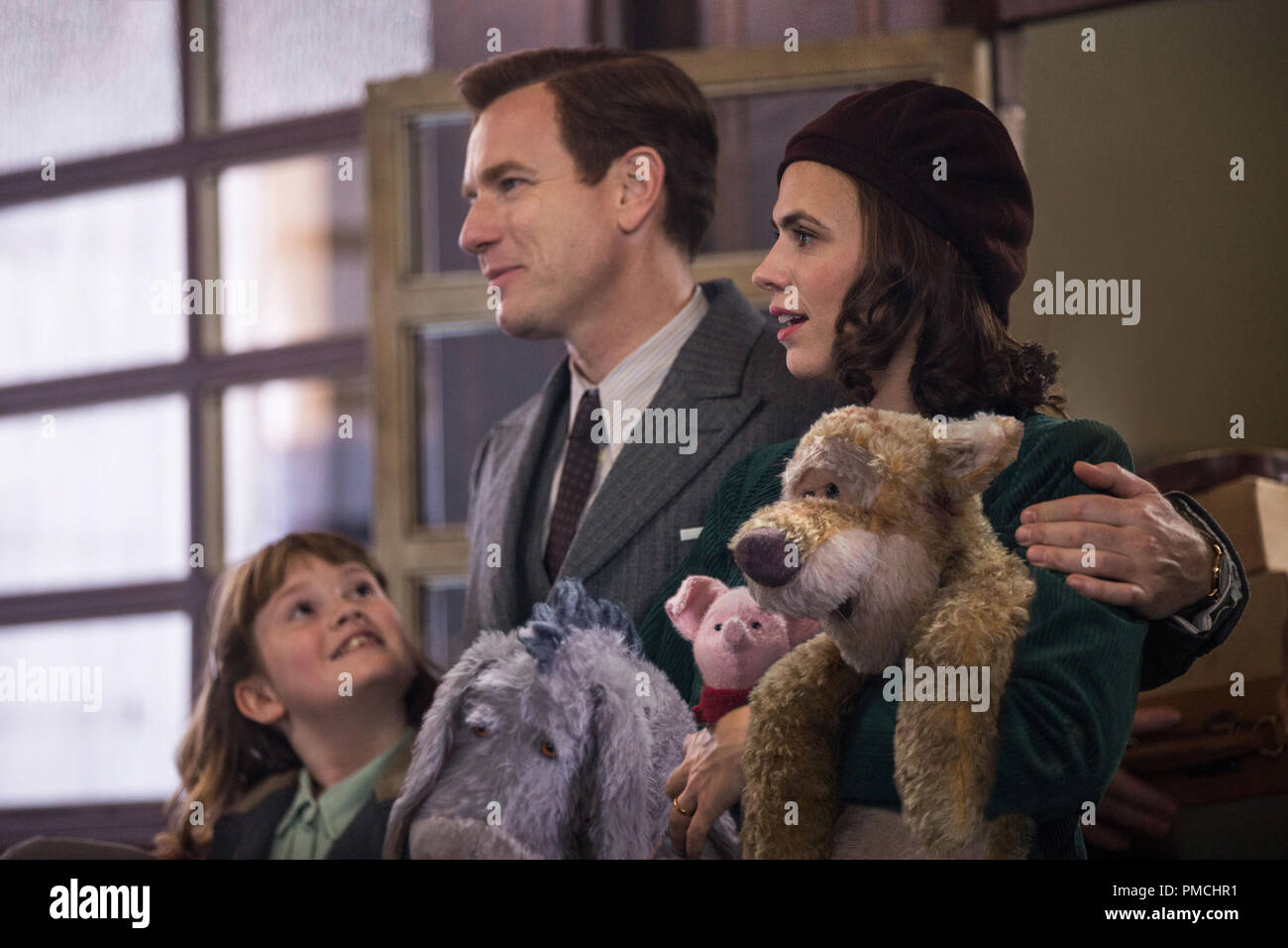 Madeline Robin (Bronte Carmichael), Christopher Robin (Ewan McGregor), Evelyn  Robin (Hayley Atwell), Eeyore, Piglet and Tigger in Disney's live-action  adventure CHRISTOPHER ROBIN Stock Photo - Alamy