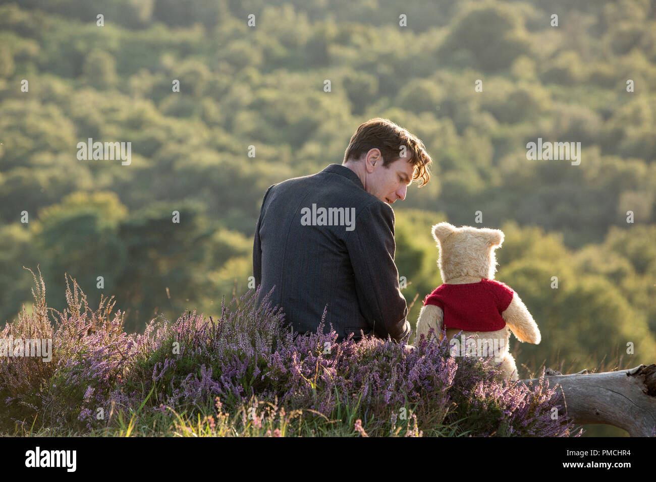 Christopher Robin. (Ewan McGregor) with his long time friend Winnie the Pooh in Disney's live-action adventure CHRISTOPHER ROBIN. Stock Photo