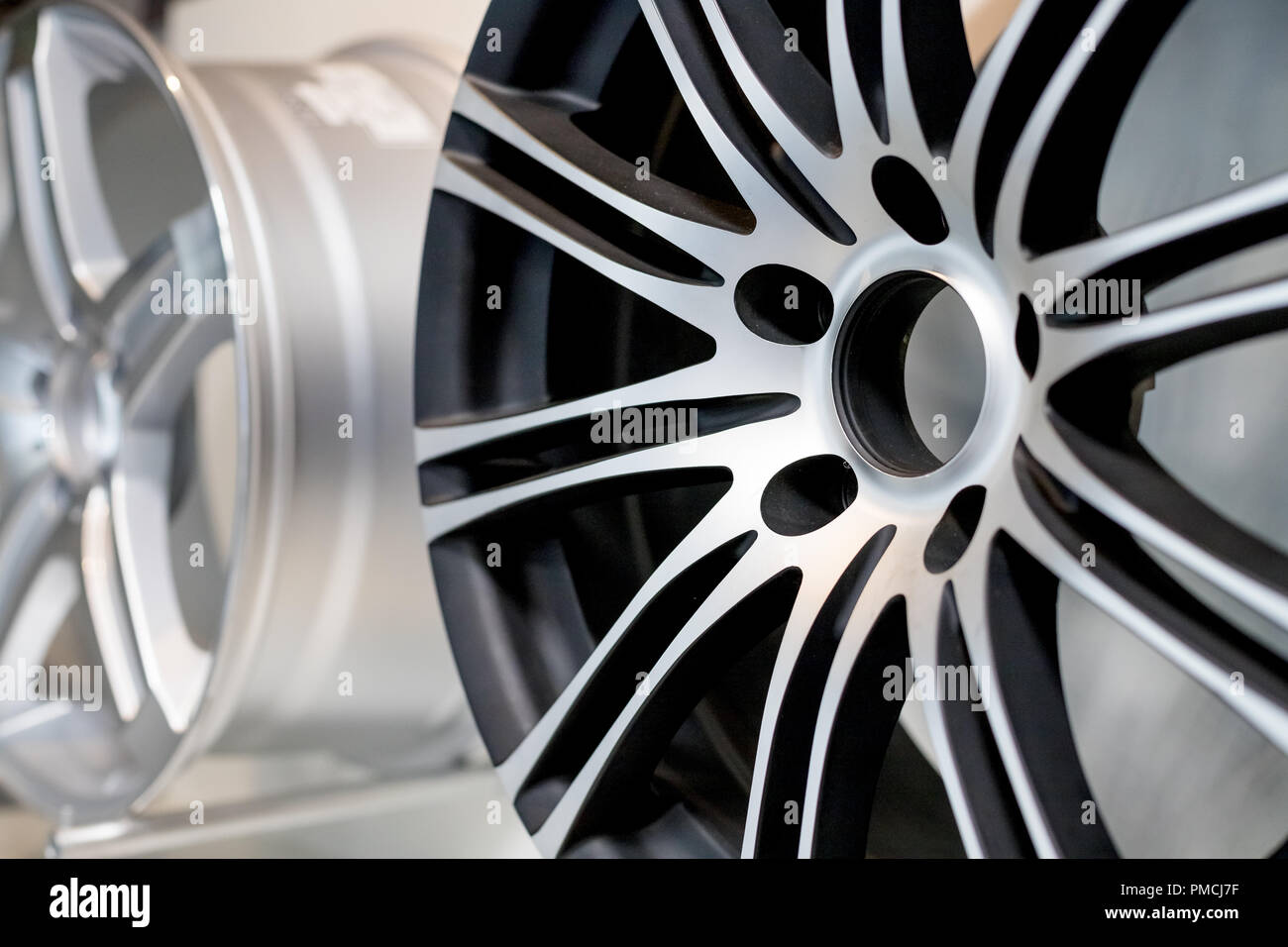 alloy wheels in wheel shop.Wheel rims on showcase. Car alloy wheels at