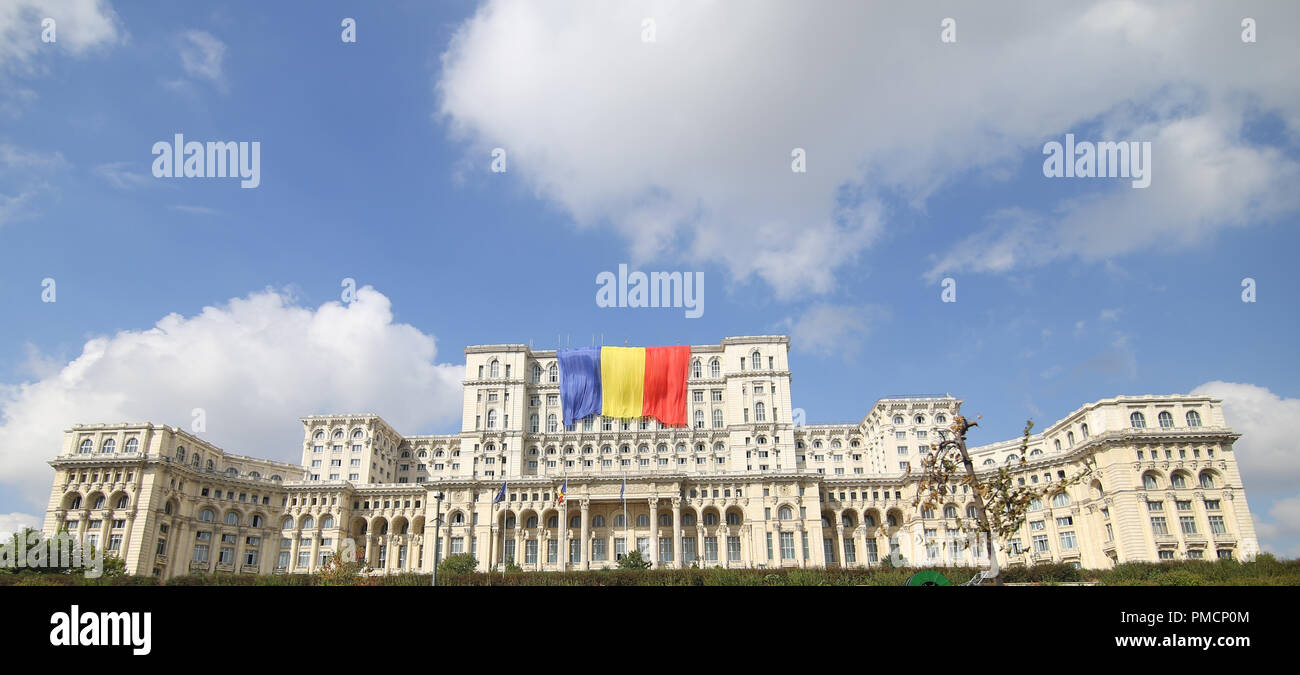 BUCHAREST, ROMANIA - September 13, 2018: Romania’s flag on the Palace of Parliament, built by Ceausescu and formerly known as House of the People, on  Stock Photo