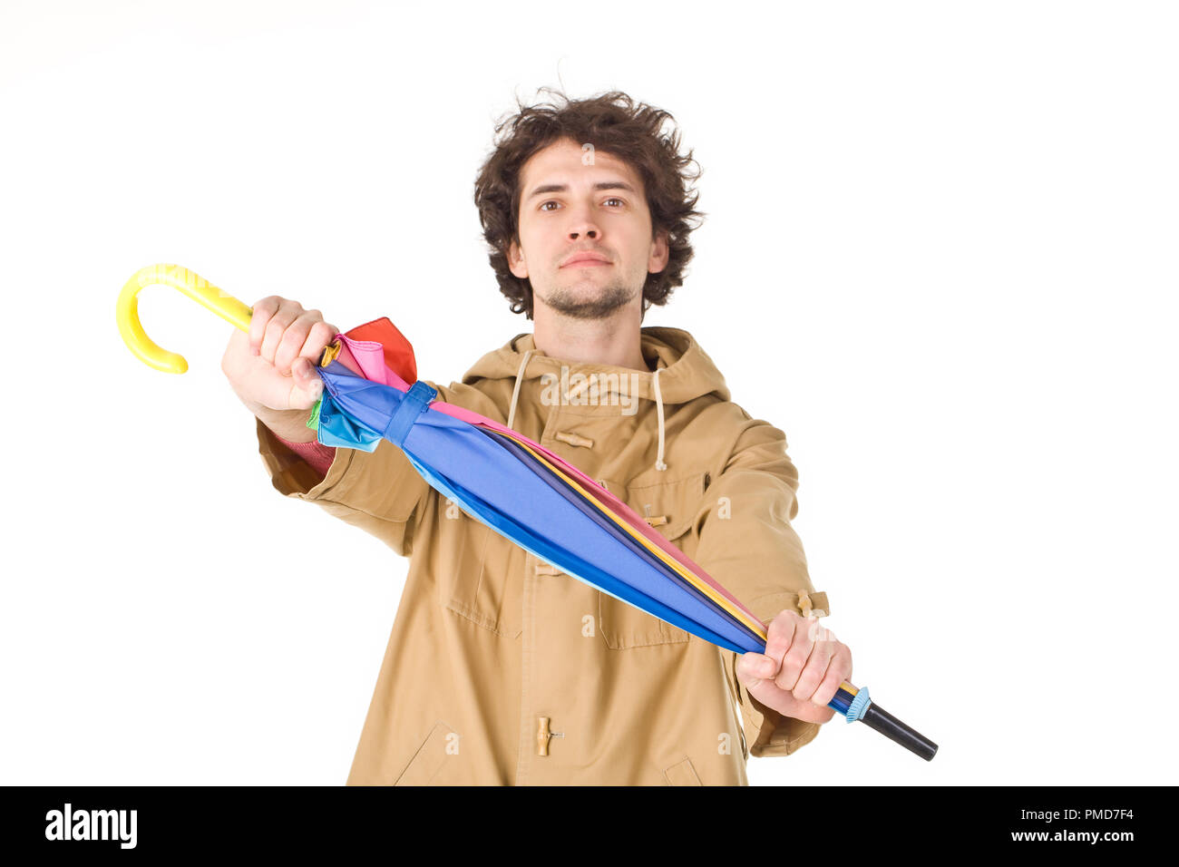 Young man keeping his umbrella Stock Photo