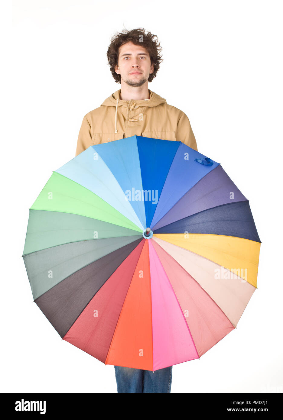 Portrait of man standing with colorful umbrella Stock Photo - Alamy