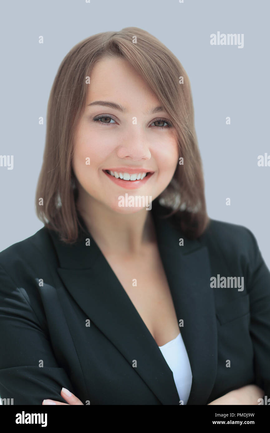 Beautiful business woman smiling isolated over a white Stock Photo