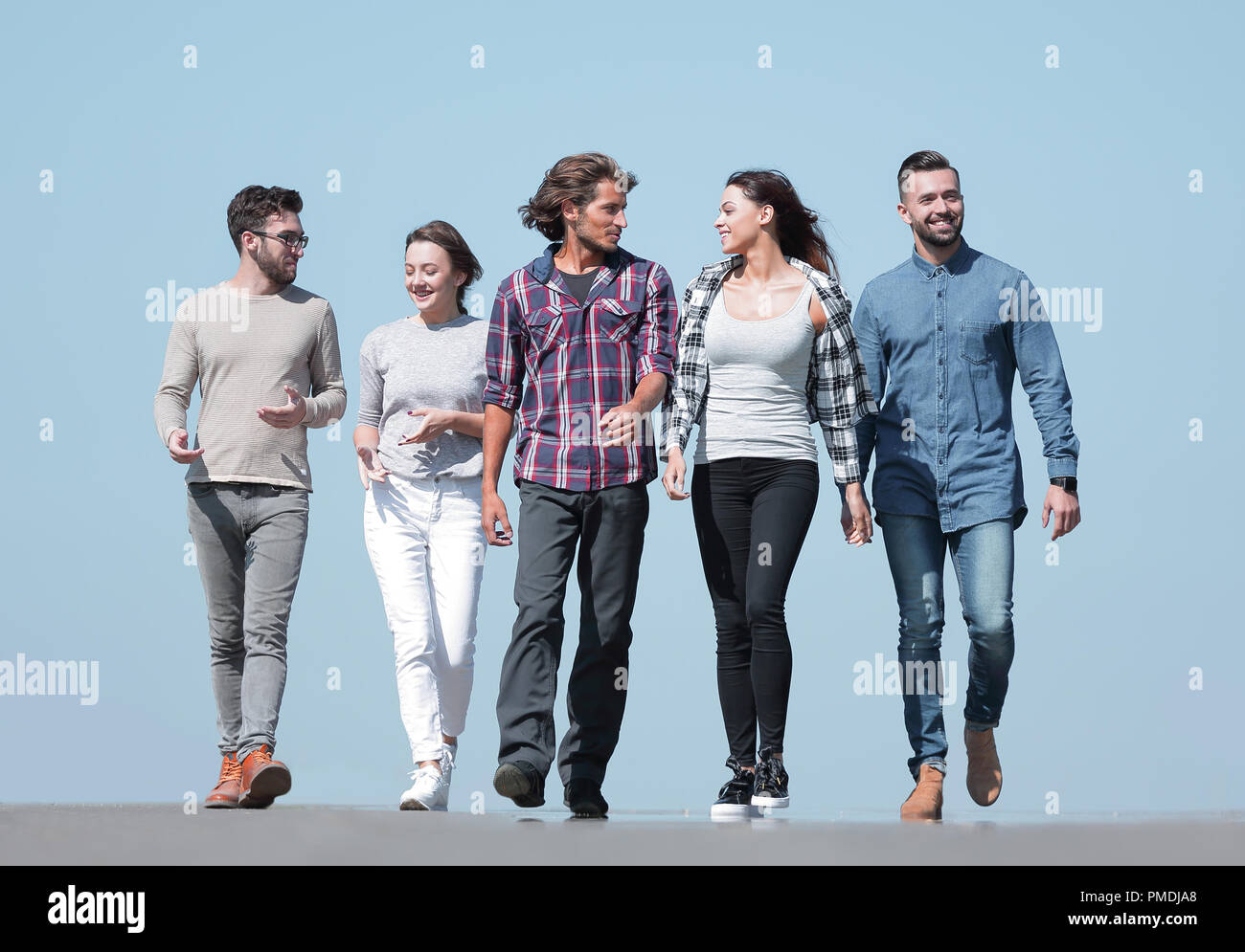 Young adults group diverse walking hi-res stock photography and images ...