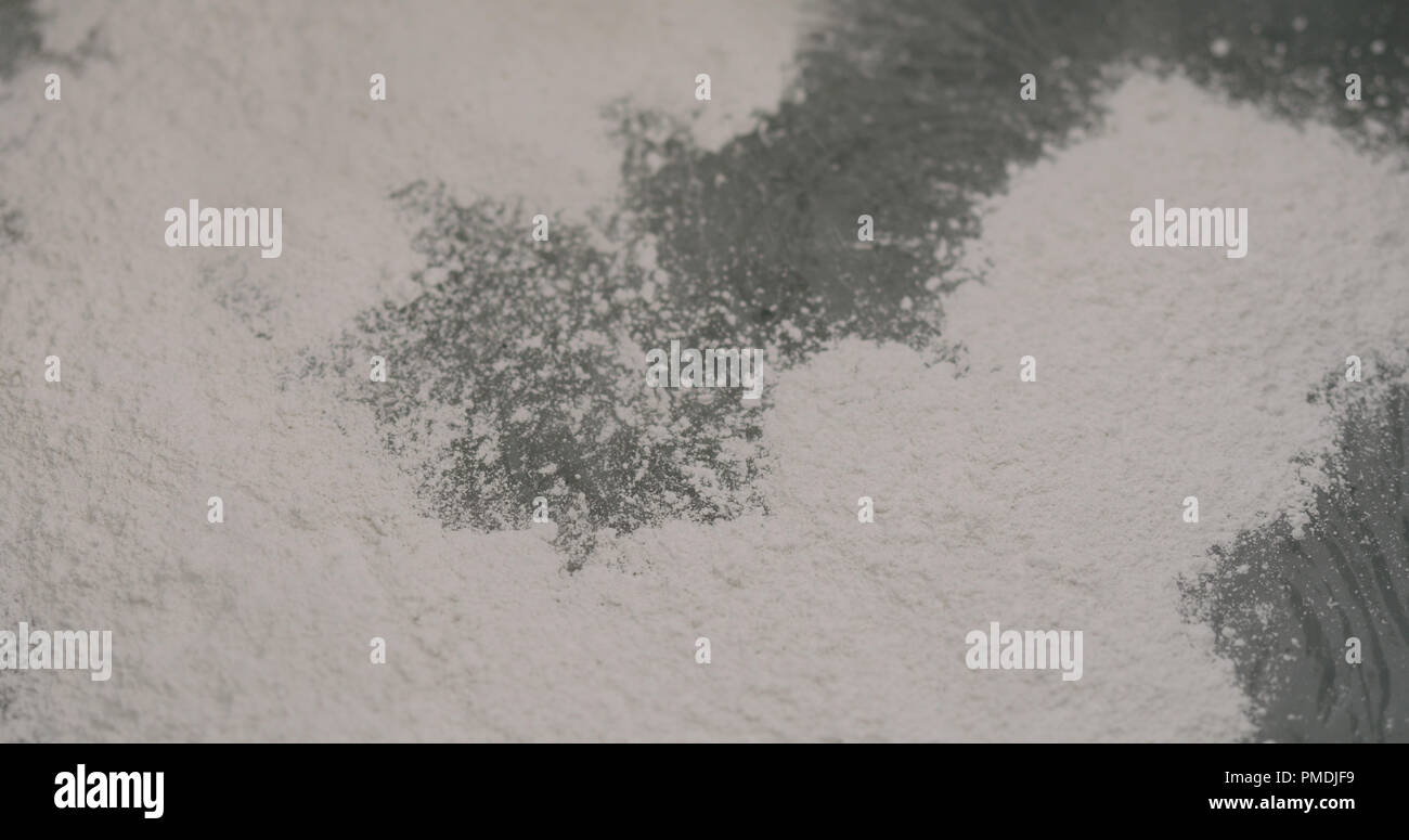 adding hardener to micro concrete plaster Stock Photo Alamy