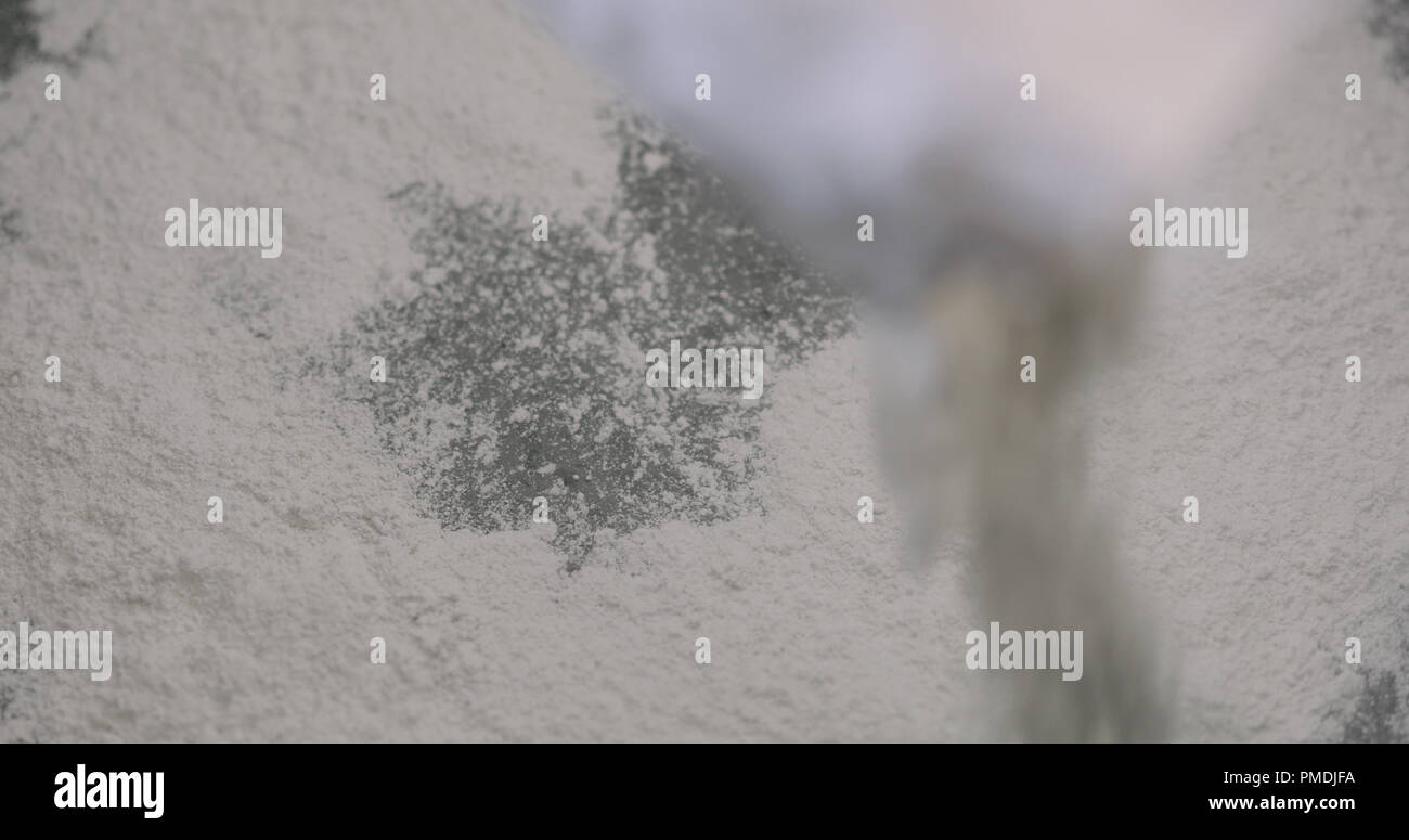 adding hardener to micro concrete plaster Stock Photo Alamy