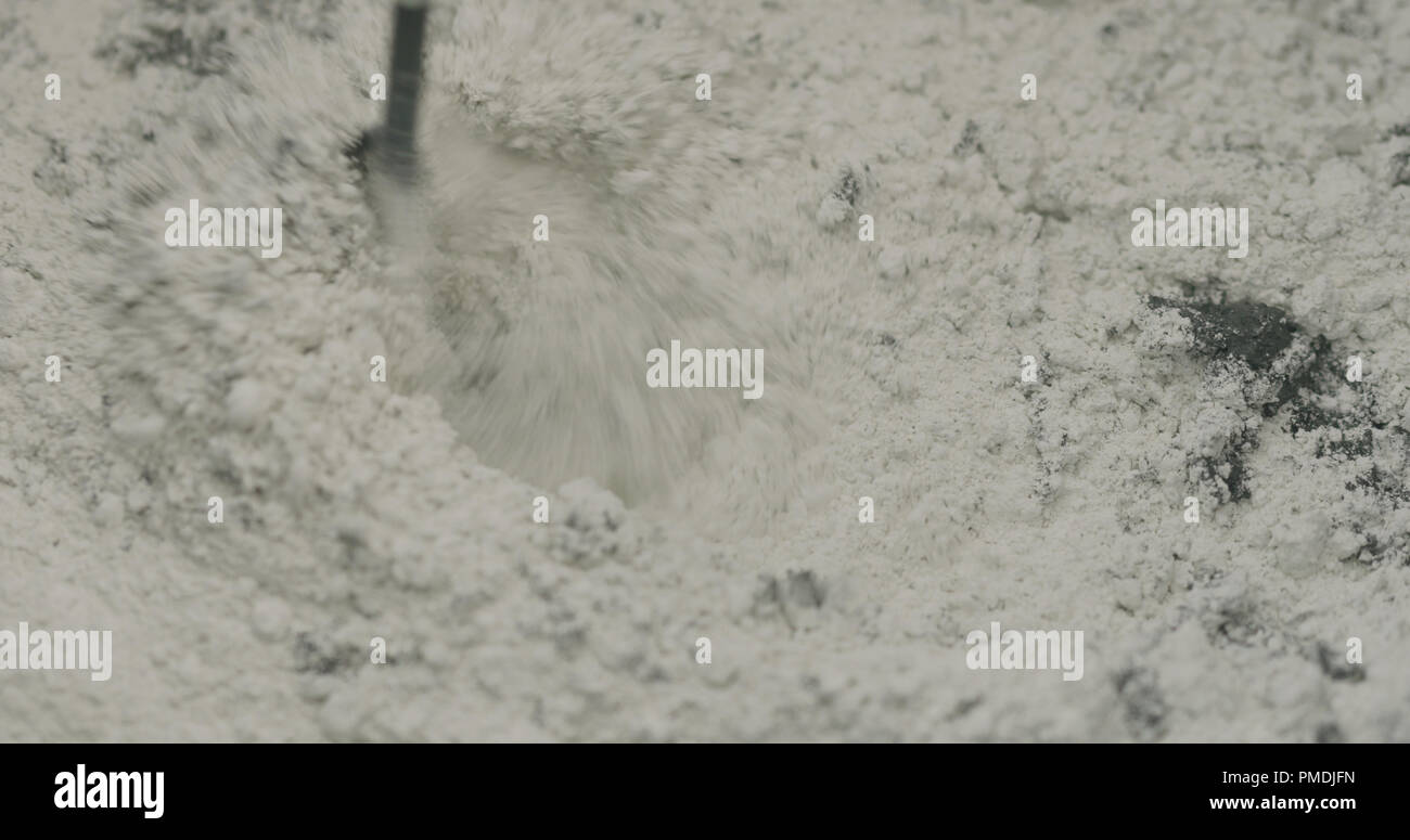 mixing hardener in micro concrete plaster Stock Photo Alamy