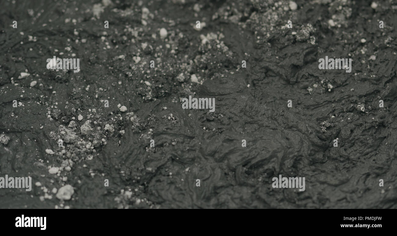 mixing hardener in micro concrete plaster Stock Photo Alamy