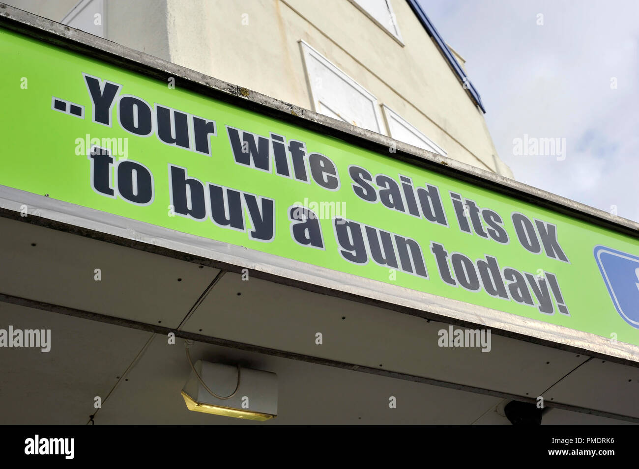 Your wife said its ok to buy a gun today Stock Photo