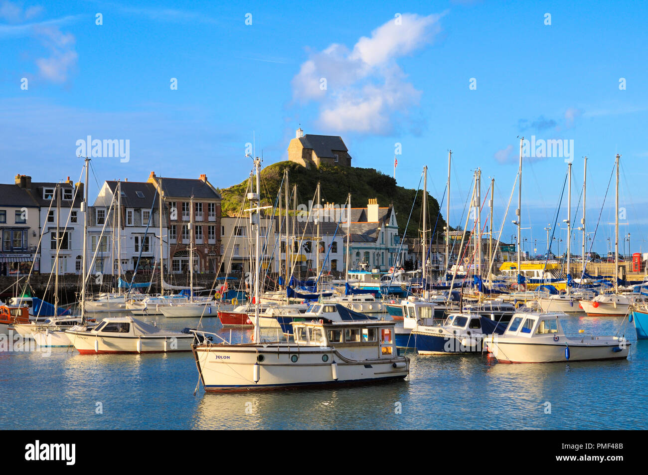 Ilfracombe harbour and St Nicholas Chapel in North Devon, England, UK Stock Photo