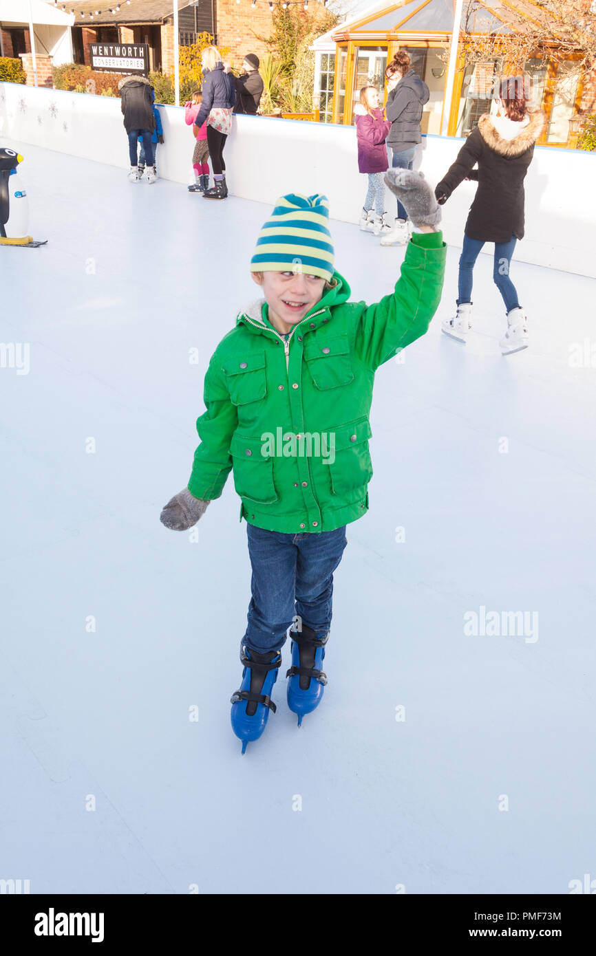 Five year old boy skating on the Ice rink at Wentworth Garden Centre