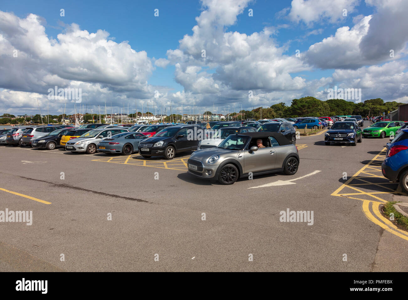 Cars circle the car park at