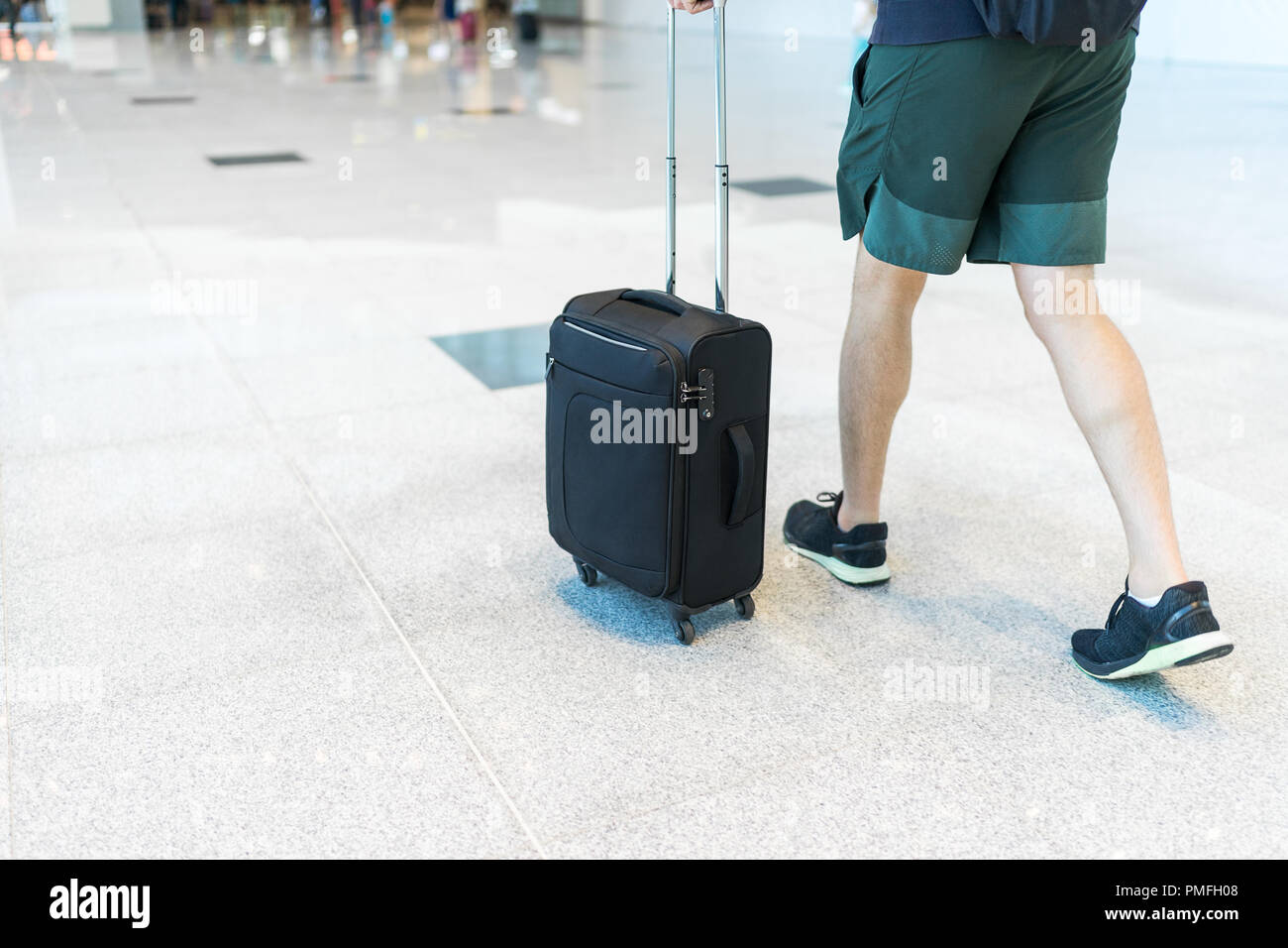 small suitcase on 4 wheels