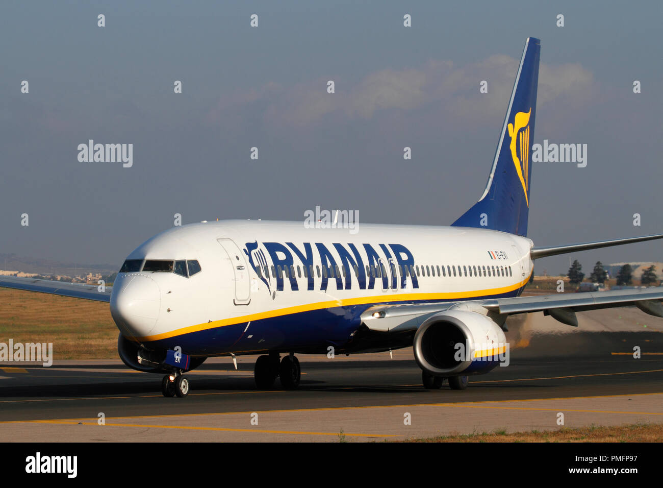 Boeing 737-800 passenger jet plane belonging to budget airline Ryanair taxiing for departure from Malta. Low cost flights and mass tourism. Stock Photo