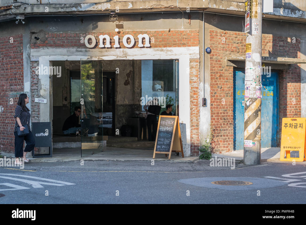 Front shot of the exterior of the popular Onion Cafe with one