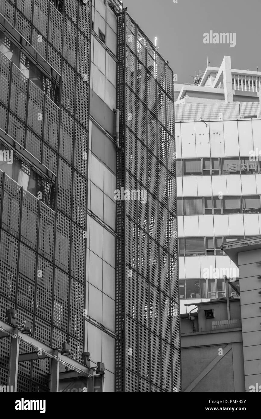 Cagey Exterior-building exteriors in black and white, one resembling a cage, in Seoul, South Korea Stock Photo