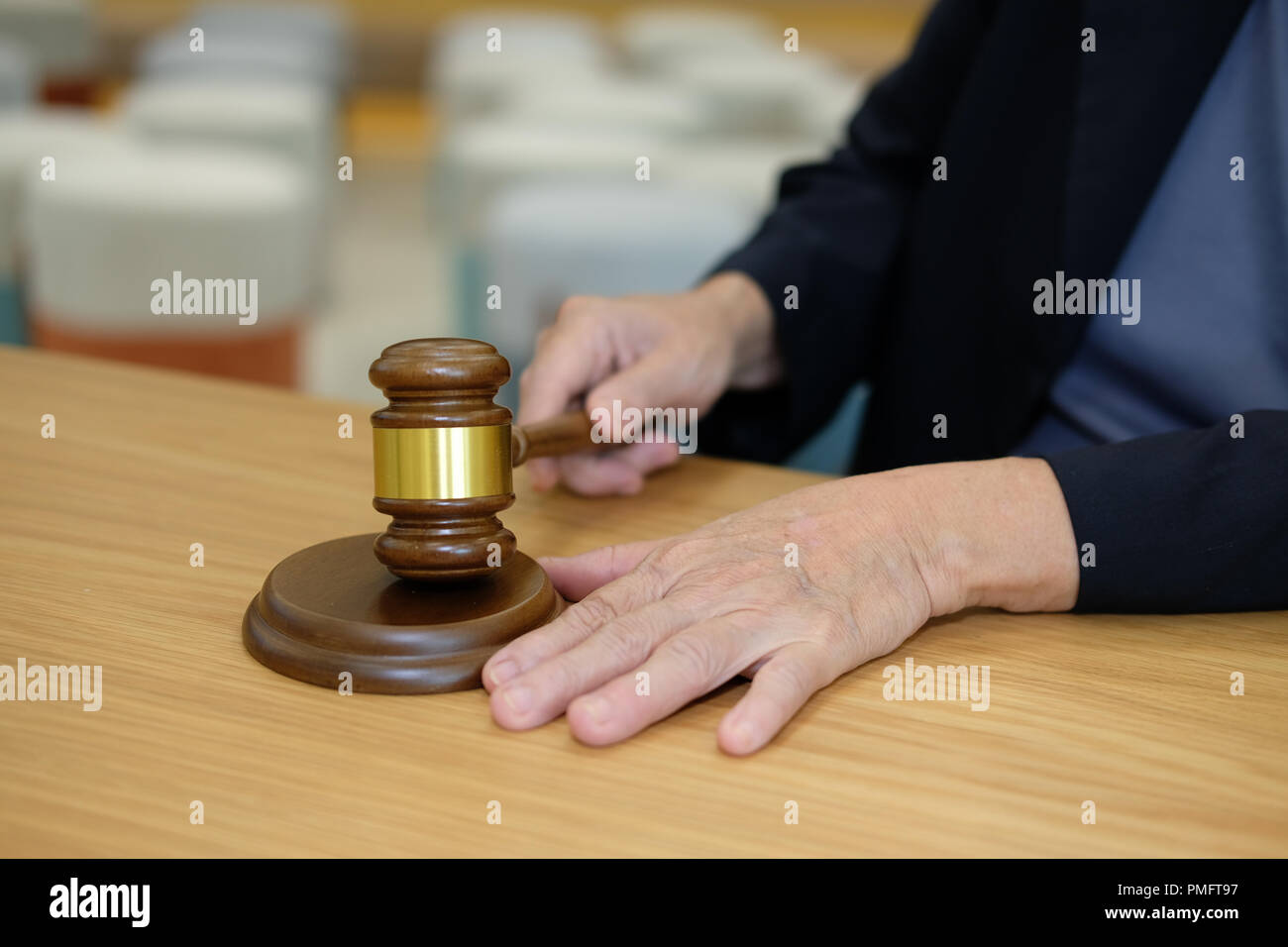 judge holding legal law gavel at courtroom. lawyer attorney justice at court Stock Photo