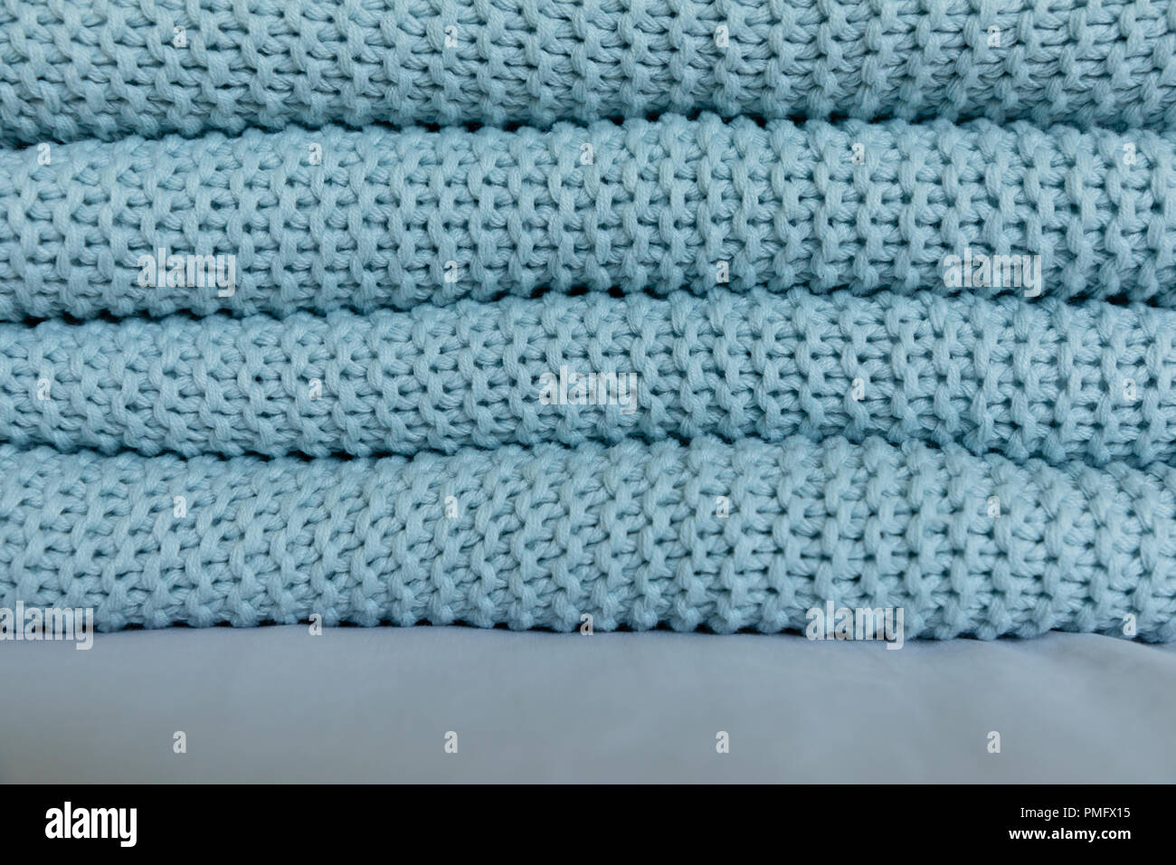 Warm and cozy Handmade knitted blankets, texture background Stock Photo