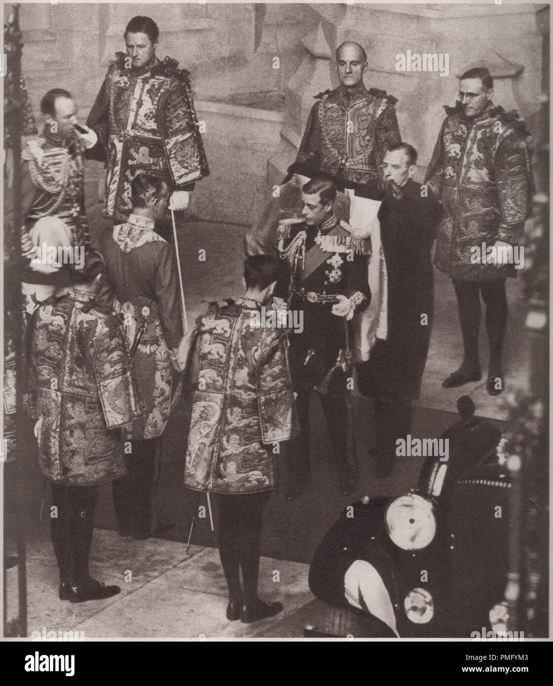 Edward the Eighth attending his first state opening of parliament on the 3rd November 1936 surrounded by heralds of the college of arms. He later abdicated the throne after seeking to marry Wallis Simpson the divorced American socialite Stock Photo