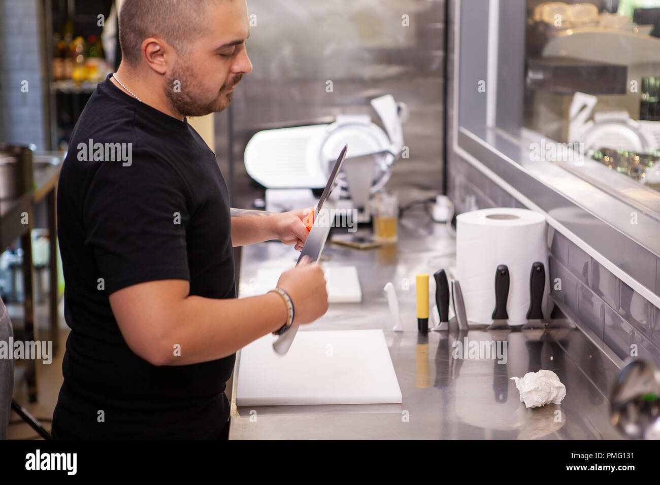 Butcher sharpening knives hi-res stock photography and images - Alamy