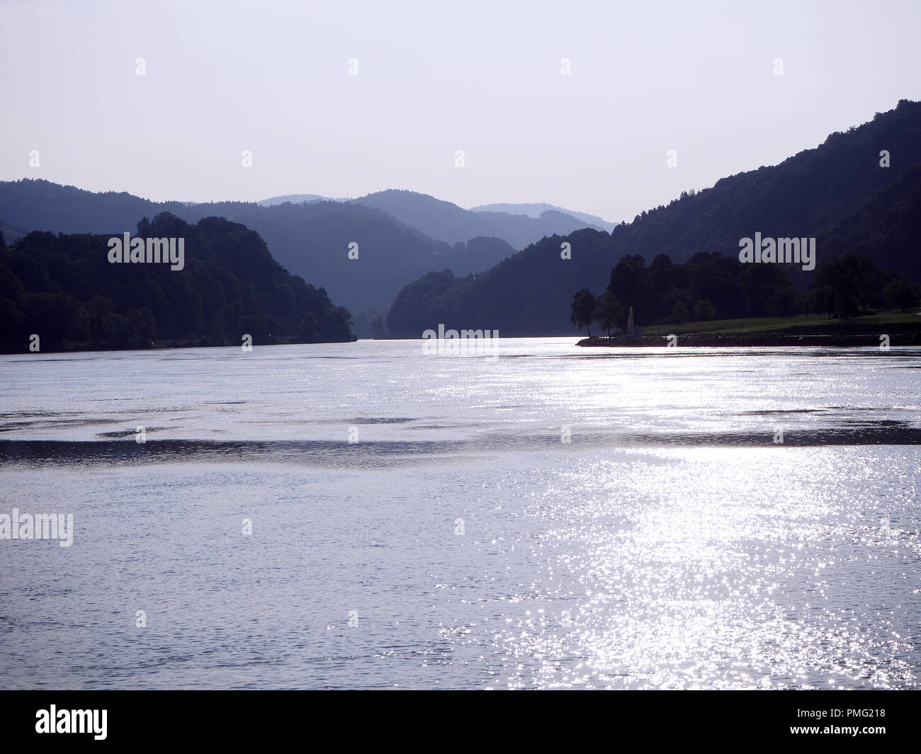 Danube River after sunset in austria, grein surrounded by mountains Stock Photo