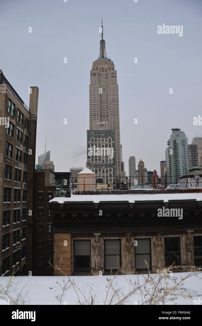 Manhattan midtown view with The Empire State Building, New York City ...