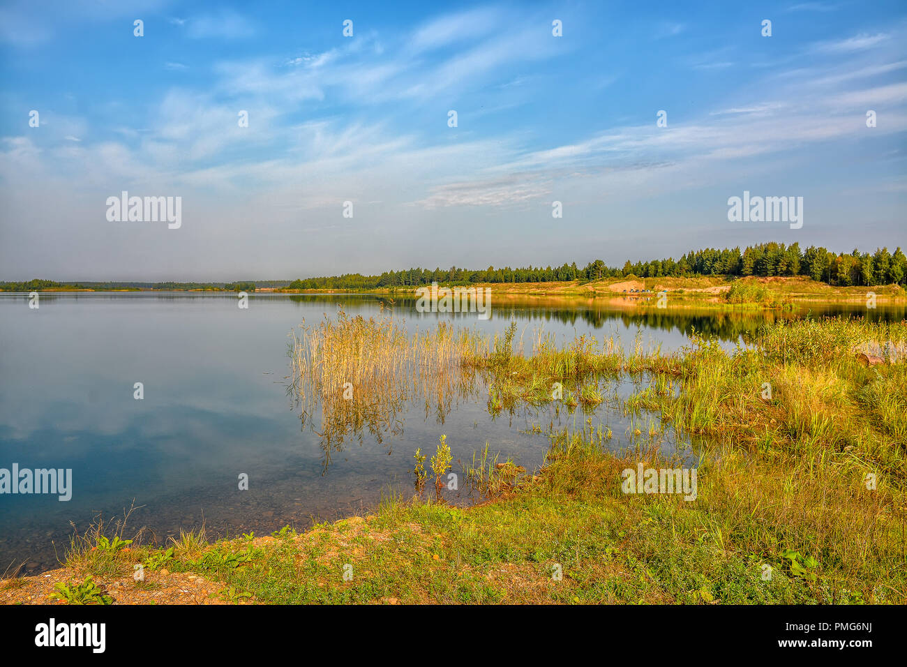 Artificial lake formed after the removal of sand. Closed sand quarry