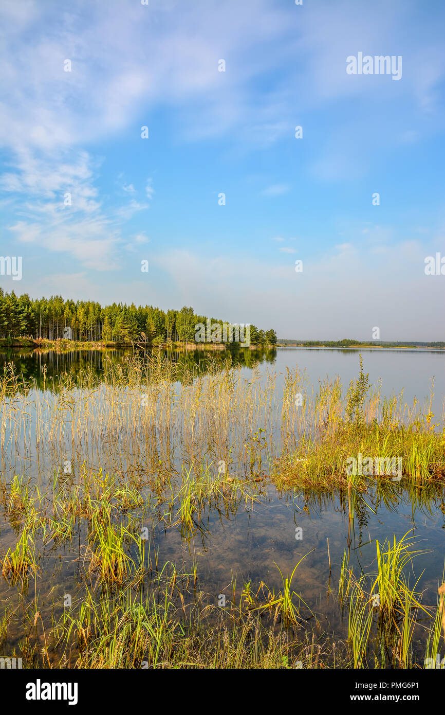 Artificial lake formed after the removal of sand. Closed sand quarry