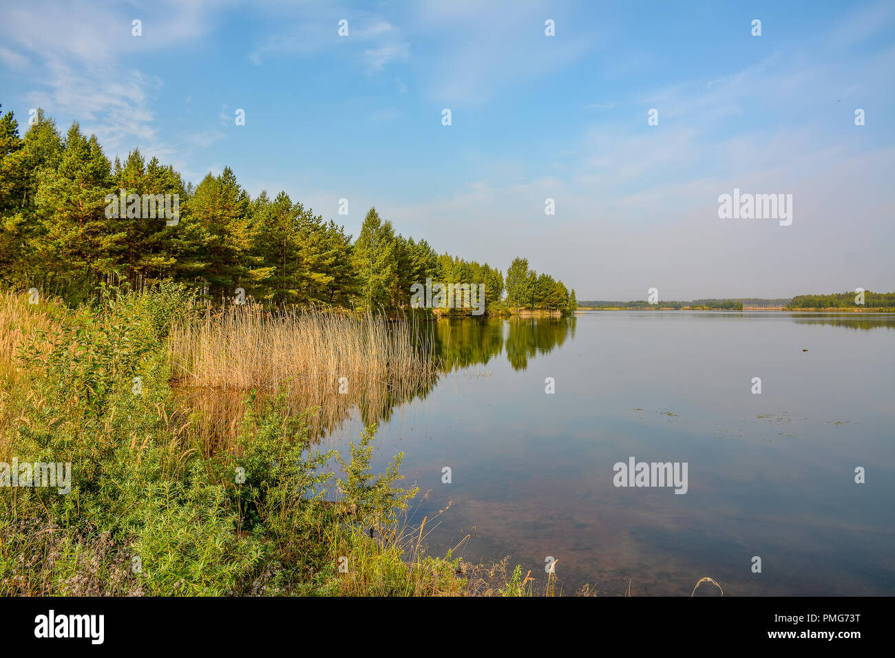 Artificial lake formed after the removal of sand. Closed sand quarry