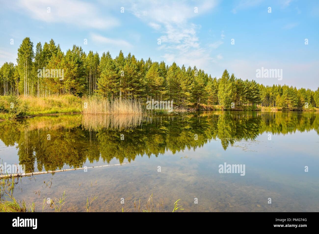 Artificial lake formed after the removal of sand. Closed sand quarry
