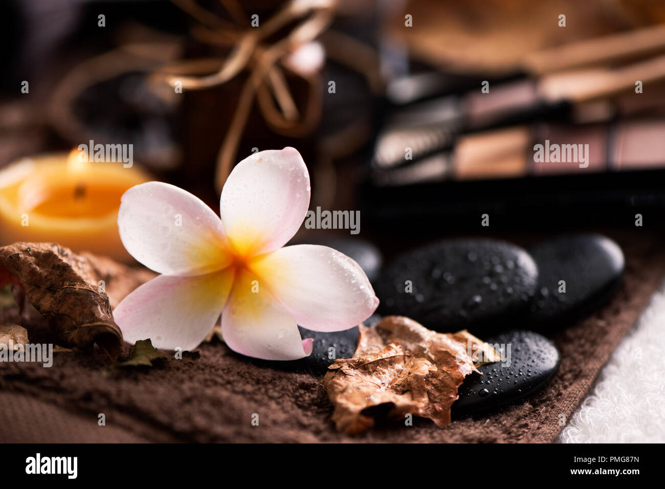 spa setting wirh make up on towel Stock Photo