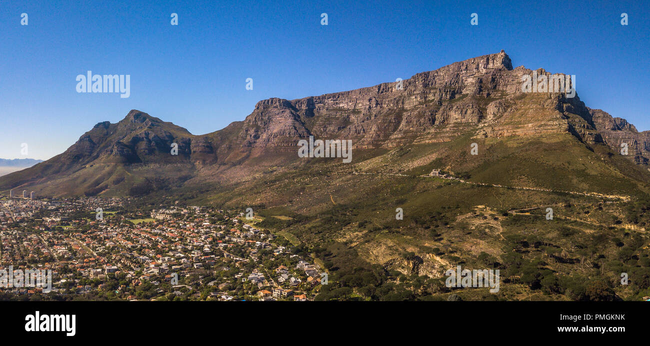 The top of Devil's Peak, and the flat crown of Table  Mountain in Cape Town, South Africa, overlook the city of CApe Town Stock Photo