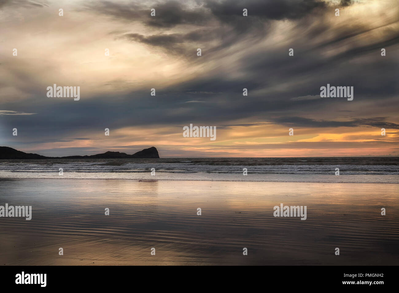 Rhossili Bay clouds Stock Photo