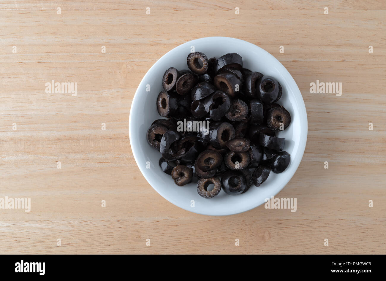 Black olives sliced on white hi-res stock photography and images - Alamy