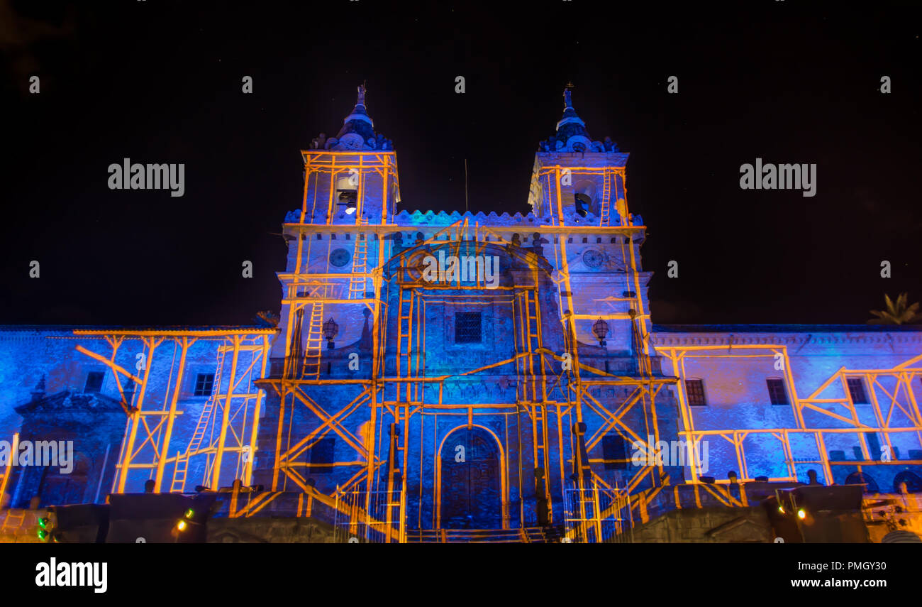 QUITO, ECUADOR- AUGUST, 15, 2018: Crowd admiring the spectacle of lights projected on the facade of San francisco church, festival of light is an event that takes place every August in Quito Stock Photo